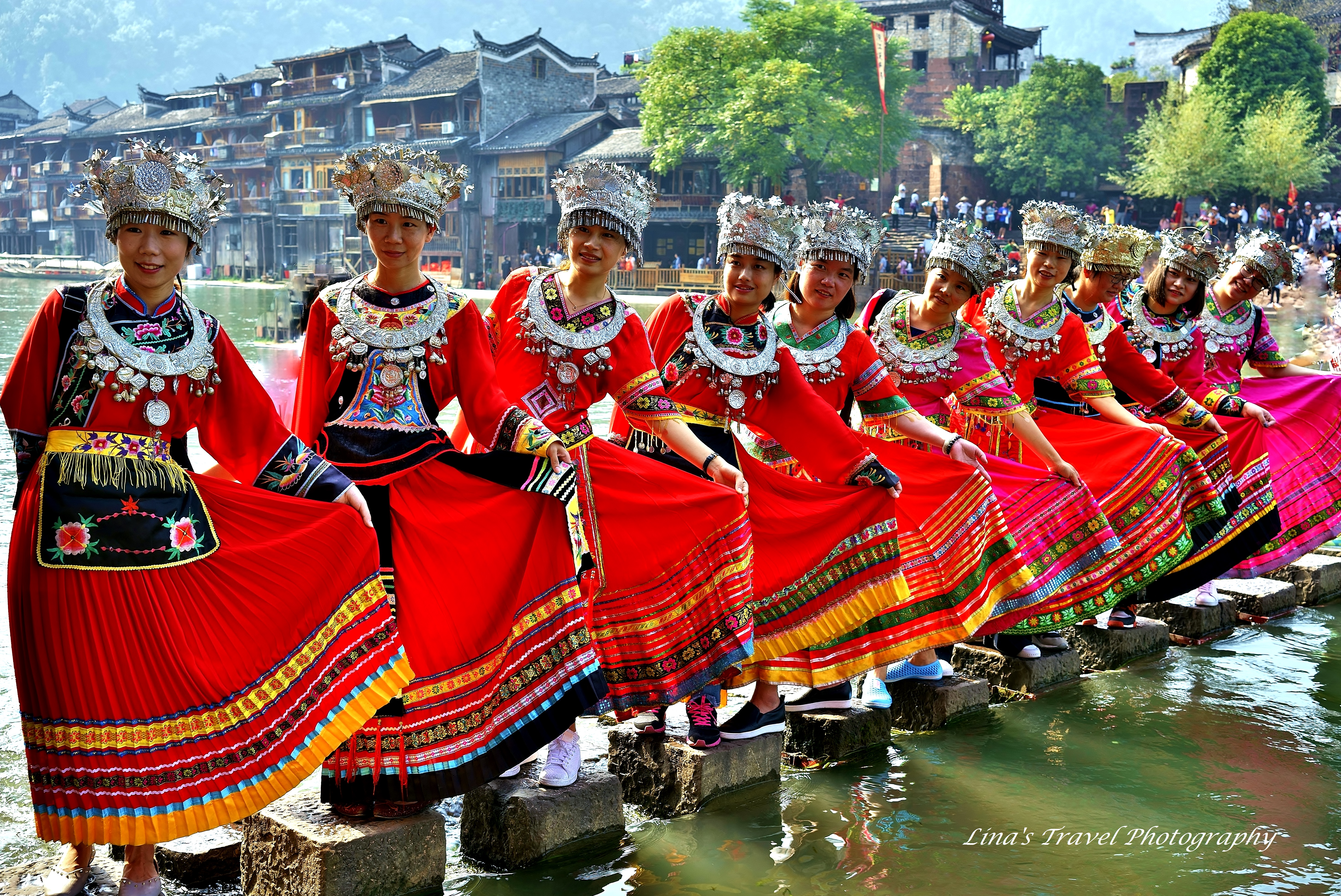 Happy tourists dress up as Miao Ethnic People, Fenghuang Ancient Town, Hunan, China