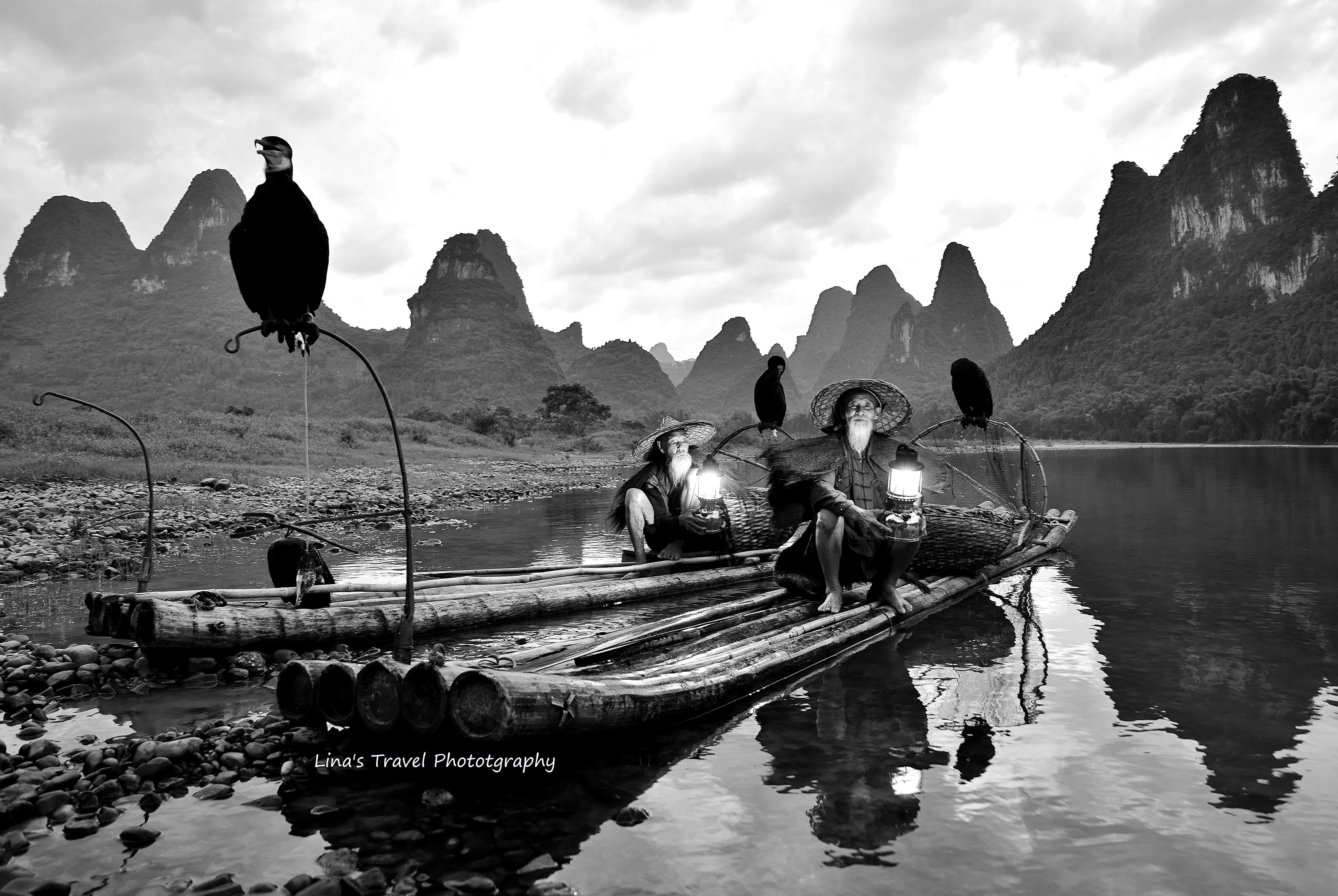 Cormorant fishing is a traditional way of life at Li River in the past, Yangshuo, China.